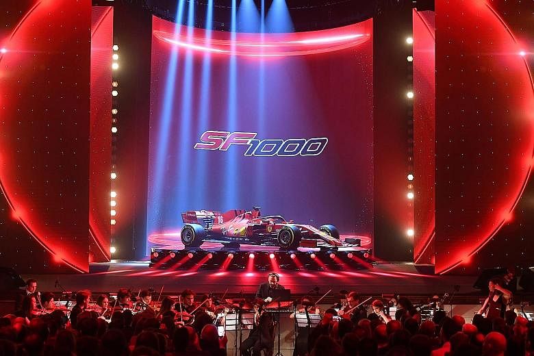 Ferrari's SF1000 being unveiled to considerable fanfare at the Romolo Valli Municipal Theatre, while accompanied by an orchestra in the northern Italian city of Reggio Emilia, some 30km away from Ferrari's home of Maranello. PHOTO: REUTERS