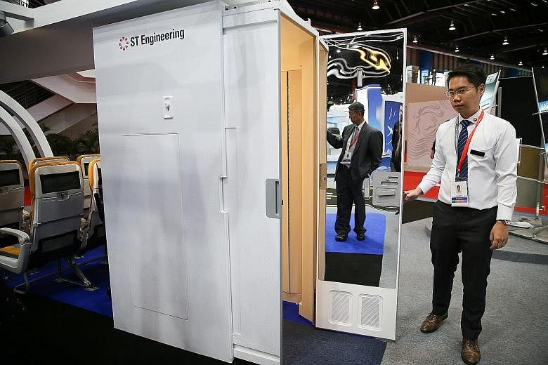 ST Engineering unveiling what it has touted as the world's first expandable lavatory at the Singapore Airshow 2020 on Wednesday.