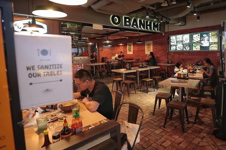 Kam's Roast, with outlets in Pacific Plaza (left) and Jewel Changi Airport, has reported a 50 per cent drop in business since the coronavirus outbreak. A restaurant in Tiong Bahru Plaza at about 2.30pm yesterday. Jewel Changi Airport is offering its 
