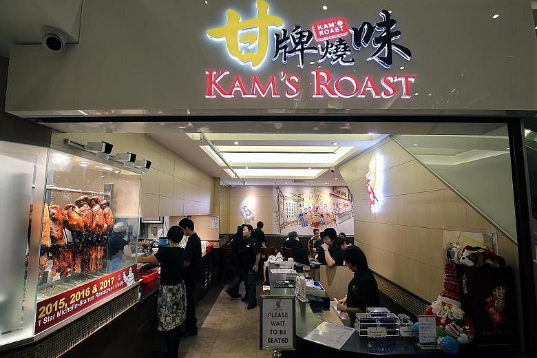 Kam's Roast, with outlets in Pacific Plaza (left) and Jewel Changi Airport, has reported a 50 per cent drop in business since the coronavirus outbreak. A restaurant in Tiong Bahru Plaza at about 2.30pm yesterday. Jewel Changi Airport is offering its 