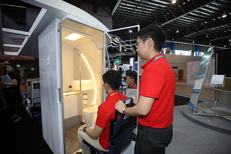 The expandable aircraft lavatory would fit an on-flight wheelchair and has user-friendly features such as grab bars and a lower-than-usual sink. The static display at the airshow featuring the debut of Republic of Singapore Air Force aircraft like th