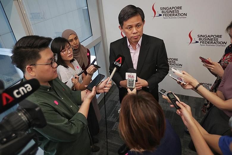 Minister for Trade and Industry Chan Chun Sing addressing members of the media at the Singapore Business Federation Centre yesterday. Mr Chan noted that though the Government can refer to support measures rolled out during past crises, each was diffe
