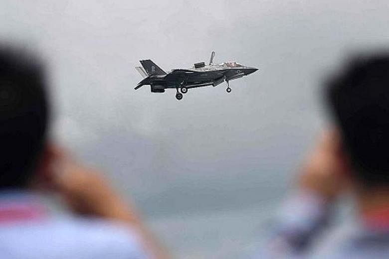 A US Air Force F35-B fighter jet taking part in an aerial display at the Singapore Airshow earlier this week.