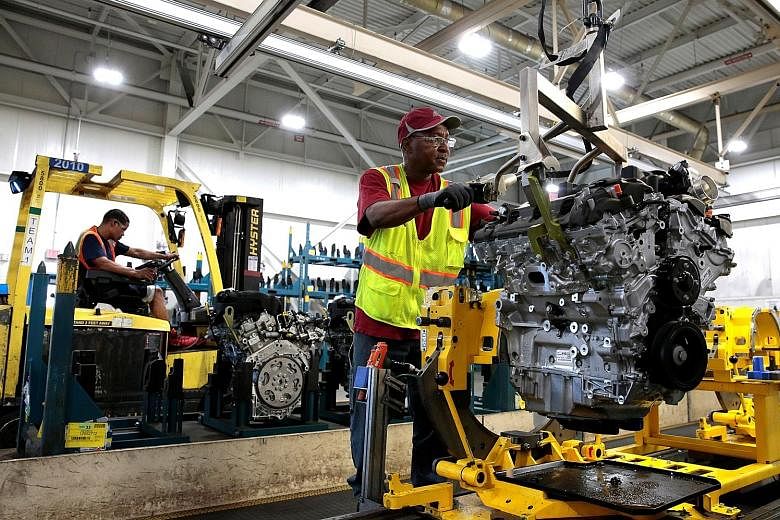 An assembly worker at the General Motors Romulus Powertrain plant in Romulus, Michigan, last year. The restructuring marks the end of the 164-year-old Holden brand in Australia, while in Thailand, the company is withdrawing the Chevrolet badge and se