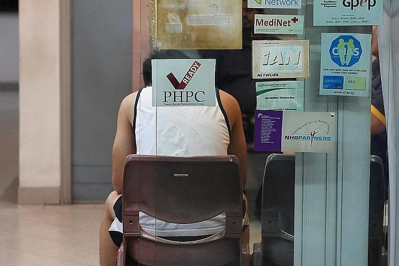 A clinic with a decal indicating that it is part of the network of Public Health Preparedness Clinics (PHPCs), which will provide subsidised treatment to patients with respiratory symptoms.