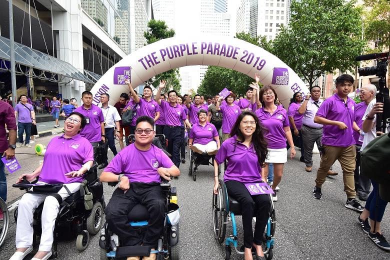 The Purple Parade, Singapore's largest annual gathering of people and organisations that support the inclusion of people with special needs, at the Suntec City outdoor space last November. ST FILE PHOTO
