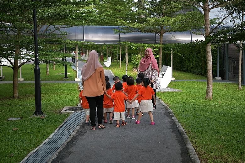 Pre-school children from My First Skool childcare centre going on a walk with their teachers in Toa Payoh. Mr Heng Swee Keat said that government-supported pre-school places will be increased to 80 per cent by 2025, up from just over 50 per cent now.