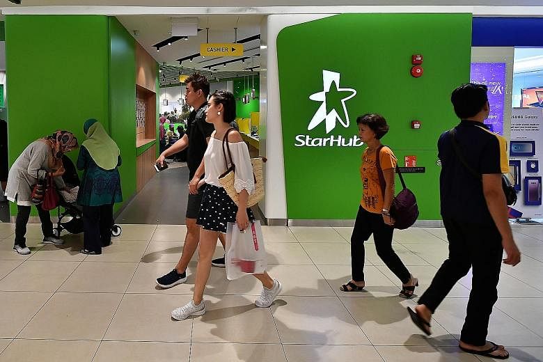 Revenue continued to fall in StarHub's core mobile, pay-television and broadband businesses. Net profit fell 7.5 per cent to $186.3 million for the full year on a 1.3 per cent decline in revenue to $2.33 billion. ST PHOTO: LIM YAOHUI