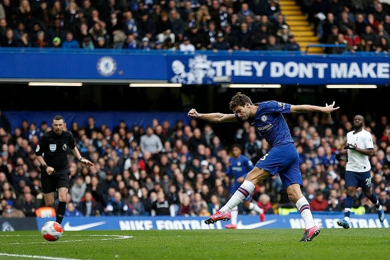 Defender Marcos Alonso rifling in Chelsea's second goal three minutes into the second half of their English Premier League match against Tottenham yesterday. At Stamford Bridge, Olivier Giroud opened the scoring for the hosts on 15 minutes with a vol