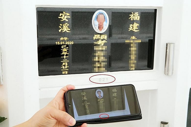 A plaque for Ms Lim's late father with someone else's photo on it seen on a phone in front of the corrected plaque yesterday. The housewife, whose full name was not stated in the Shin Min report, said she found out about the mistake after the operato