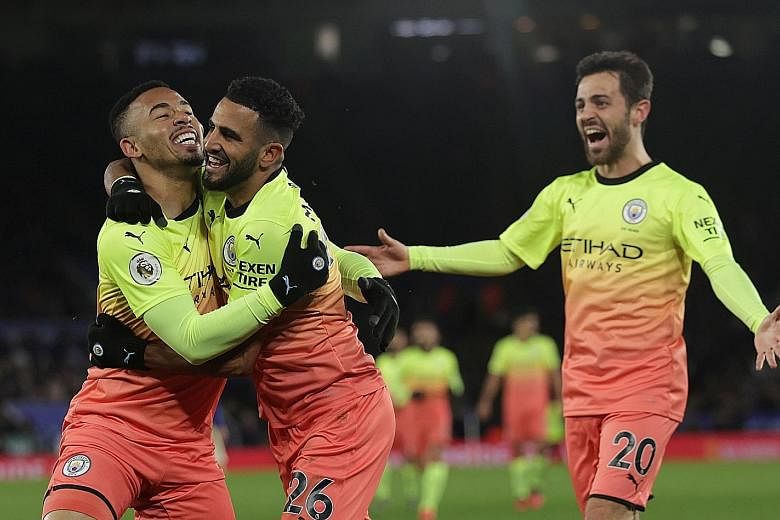 Gabriel Jesus and Algerian Riyad Mahrez celebrating the Brazilian's goal - the only one in Manchester City's win over Leicester on Saturday. 