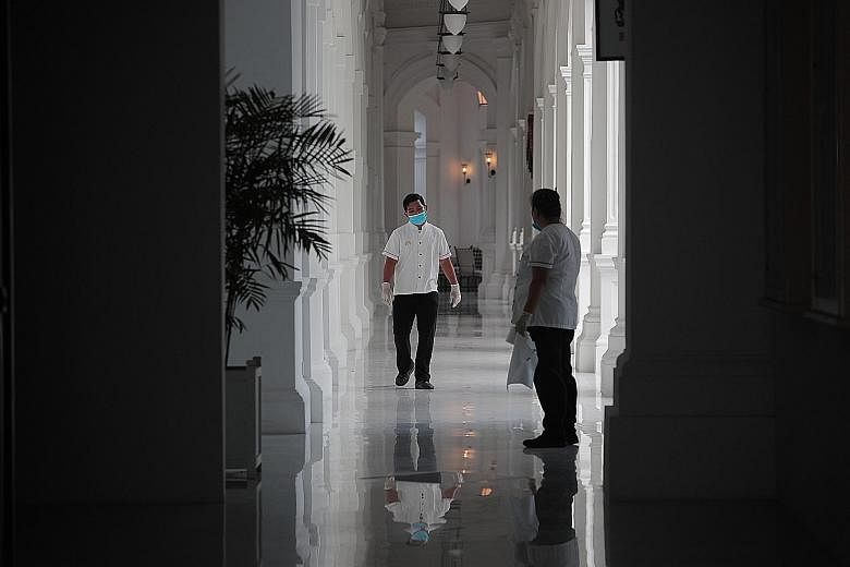 Hotels in Singapore have adopted cost-cutting measures as occupancy plummets amid the virus outbreak, including sending staff for training during the lull and shortening hours for services such as in-room dining. ST PHOTO: JASON QUAH