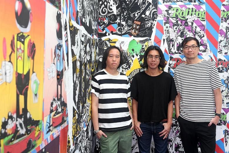 Phunk’s co-founders (above from left) William Chan, Alvin Tan and Jackson Tan at the Control Chaos: 25 Years Of Phunk exhibition at the National Design Centre. The trio, along with Melvin Chee (not pictured), founded the collective in 1994. 