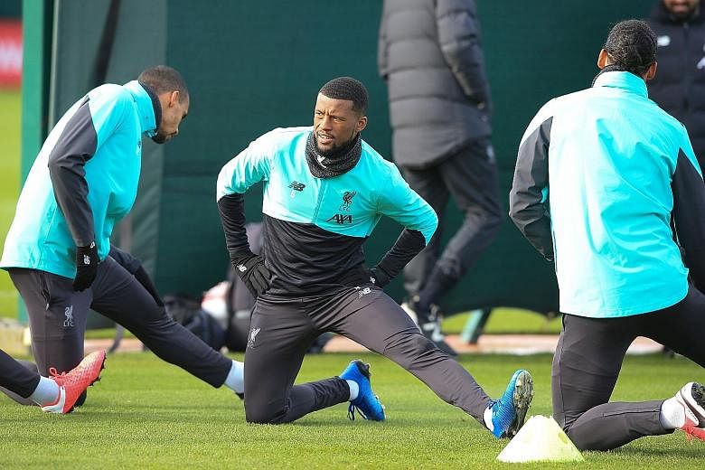 Liverpool midfielder Georginio Wijnaldum credits his team's success to learning from past mistakes. He scored in the Reds' 3-2 win over West Ham on Monday and wants the side to build on that result. PHOTO: AGENCE FRANCE-PRESSE
