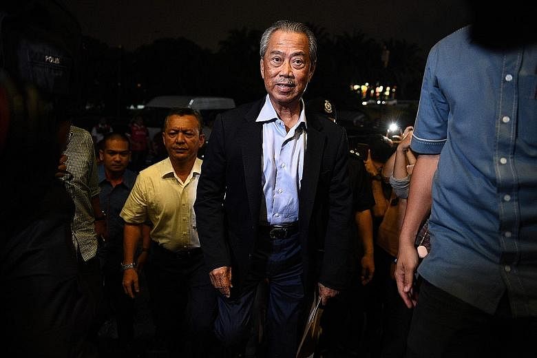 Parti Pribumi Bersatu Malaysia president Muhyiddin Yassin arriving at the party headquarters in Kuala Lumpur on Monday. With his rise, Malaysia could have a "backdoor government". PHOTO: AGENCE FRANCE-PRESSE