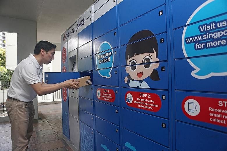 A resident collecting a parcel from a parcel locker station in Punggol last week. The nationwide roll-out follows a successful trial launched in December 2018 by the Infocomm Media Development Authority. For the trial, 62 locker stations were deploye