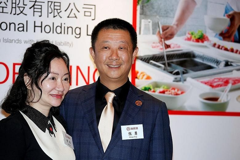 Ms Shu Ping, seen here with her husband, Mr Zhang Yong, is the sole shareholder and director of the new family office, Sunrise Capital Management.