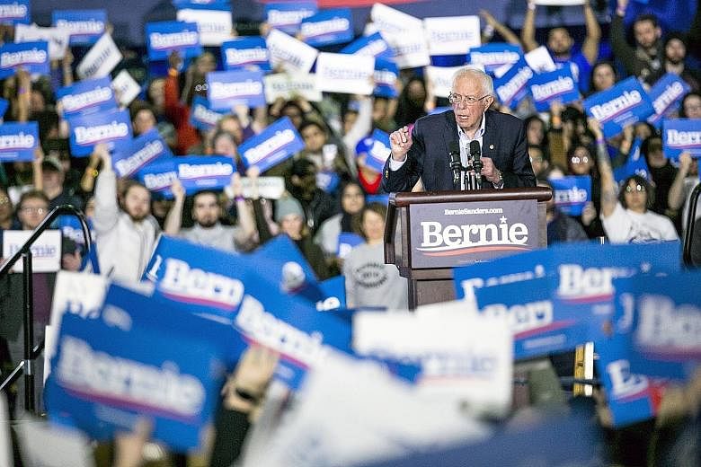 Democratic presidential hopeful Bernie Sanders speaking at a rally in Detroit, Michigan, on Friday. After major disappointments on Super Tuesday last week, Mr Sanders is hoping for a comeback on Tuesday as six states go to the polls, none more crucia