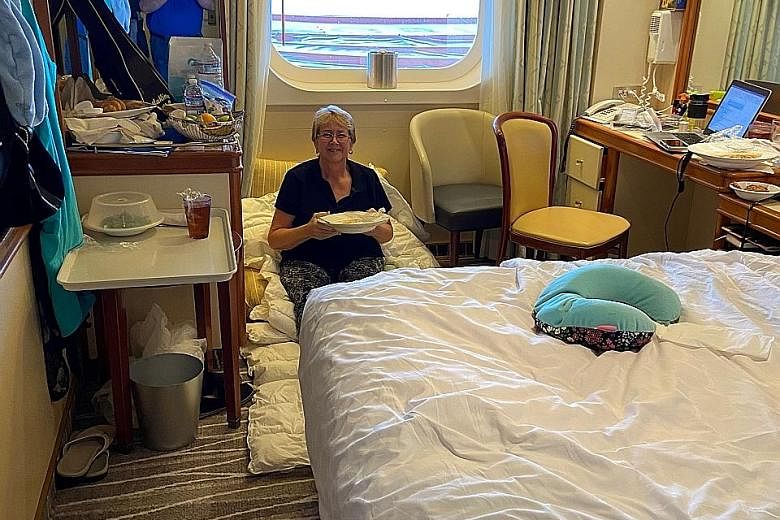 Top: The Grand Princess cruise ship will be taken to a non-commercial port where everyone on board will be tested, says US Vice-President Mike Pence. Above: A passenger confined to her room on the cruise ship.
