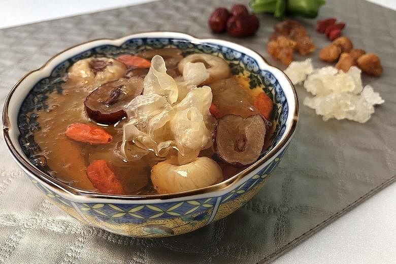 The Triple Beauty Booster Soup (above) is made with wolfberries, red dates, dried longans, brown sugar slabs, snow fungus, pandan leaves, xue yan and peach gum.