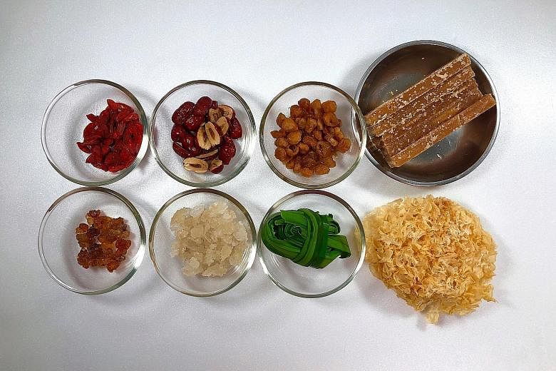 The Triple Beauty Booster Soup is made with (above, clockwise from top far left) wolfberries, red dates, dried longans, brown sugar slabs, snow fungus, pandan leaves, xue yan and peach gum.