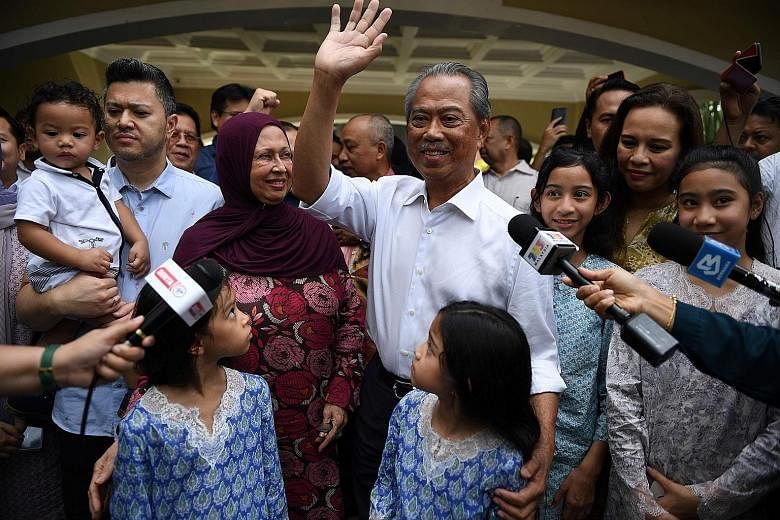 Tan Sri Muhyiddin Yassin and his family outside his home in Kuala Lumpur on Feb 29, after royal officials had named him Malaysia's eighth prime minister. Few observers would have predicted that Mr Muhyiddin would seize the premiership from household 