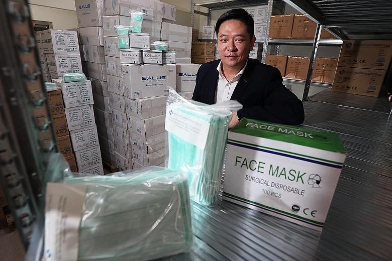 Mr Winthrop Wong (above) is director of Wellchem Pharmaceuticals, which supplies masks to hospitals here. Mr Gjan Lim (left) is managing director of Healthcare Essentials, a medical supplier for hospitals and clinics here. ST PHOTOS: ASHLEIGH SIM, KE