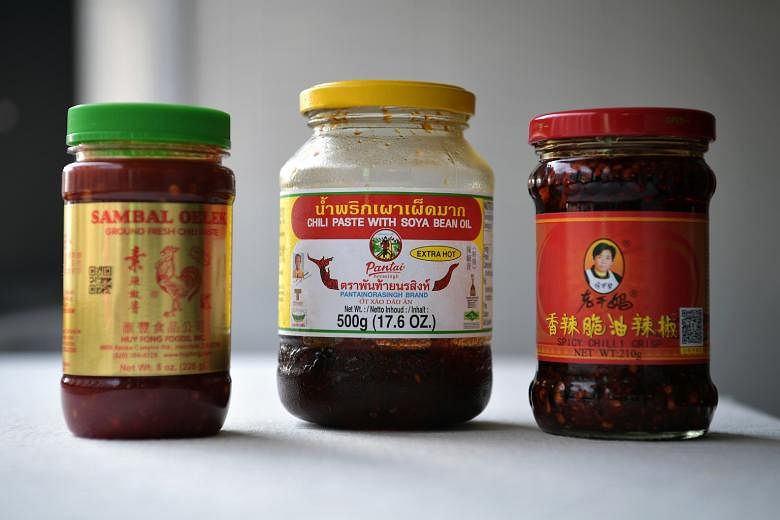 Ingredients include tamarind paste and sambal oelek, Thai chilli paste or Lao Gan Ma chilli (above).