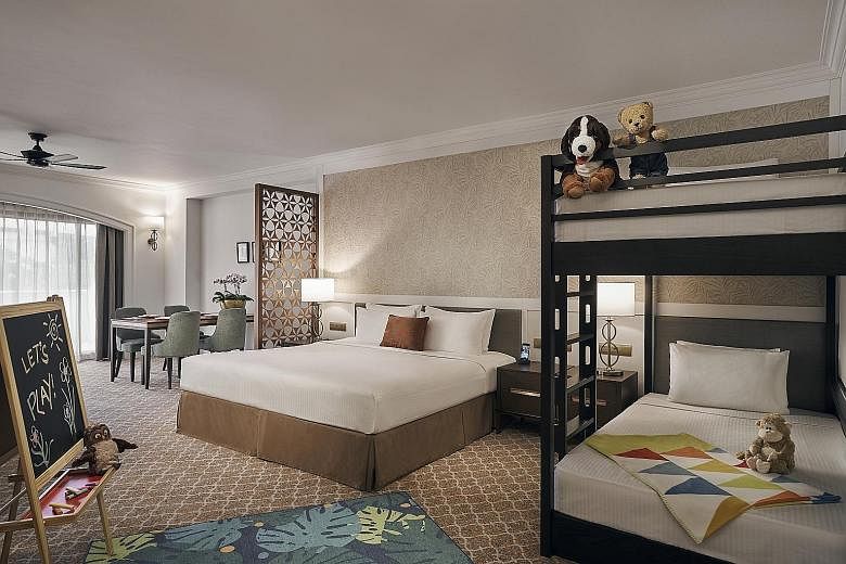 Find peace and serenity at Capella Singapore in Sentosa or pile the family into this cosy room at Orchard Rendezvous Hotel, which comes with doubledecker beds (above) for the children. 