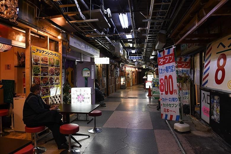 An empty underground shopping centre in Tokyo's Asakusa district on Sunday. The worse-than-expected gross domestic product data showed that the economy was already in a highly fragile state when the virus started to knock back exports, supply chains,
