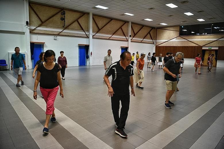 A line dancing class at the multi-purpose hall of Siglap South Community Centre yesterday. The suspension of People's Association activities for those aged 50 and older for two weeks from today will affect 2,600 classes and 290,000 participants. ST P