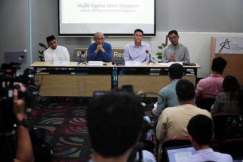 From left: Singapore Mufti Nazirudin Mohd Nasir, Minister-in-charge of Muslim Affairs Masagos Zulkifli, Muis chief executive Esa Masood and senior director of mosque and community development Helmy Isa at a press conference yesterday on moves to curb