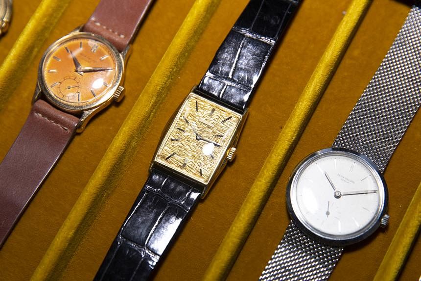 The Patek Philippe offerings from Mr John Reardon (left) include (above, from left) a pink gold Reference 96, 1953; a yellow gold Reference 2554 Manta Ray, 1964; and a steel anti-magnetic Reference 3418, 1961.