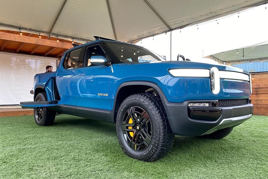The Rivian R1T all-electric truck (above).