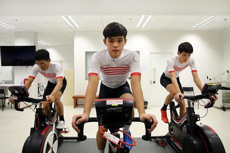 National training squad members (from far left) Darren Lim, 22, Samuel Leong, 18, and Tim Schmidt, 19, all aim to race professionally. PHOTO: LIANHE ZAOBAO