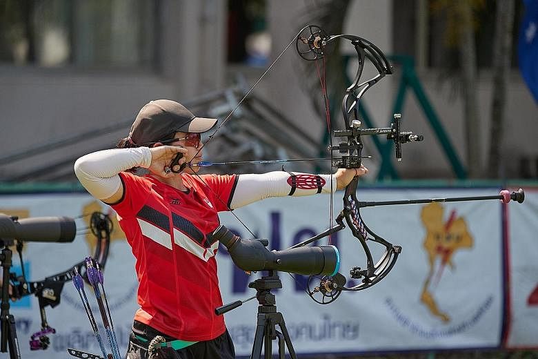 Contessa Loh won the gold via a walkover after Thai authorities cancelled her final opponent's visa. PHOTO: WORLD ARCHERY ASIA