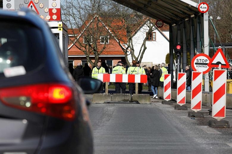 Coronavirus Denmark announces first death closes borders The