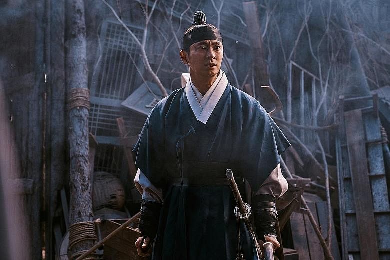In the South Korean series Kingdom, actor Ju Ji-hoon (above) plays Lee Chang, a righteous prince, and actress Bae Doo-na as a physician caught in the middle of a zombie outbreak.