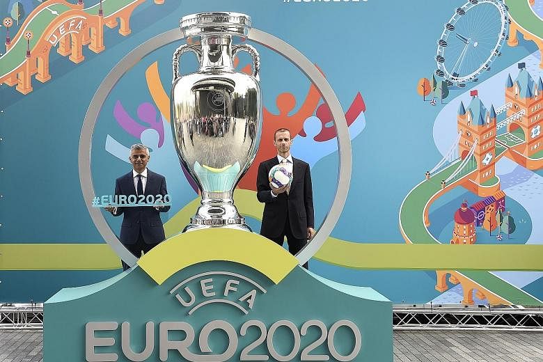 London Mayor Sadiq Khan and Uefa president Aleksander Ceferin at the unveiling of the Euro 2020 tournament and the host city logo in London's City Hall in September 2016. The quadrennial 24-team tournament has been postponed to next year amid the cor