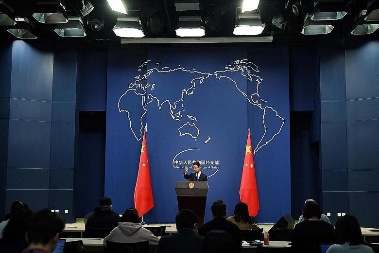 Chinese Foreign Ministry spokesman Geng Shuang at a daily press briefing in Beijing yesterday. When asked whether journalists working in Hong Kong would be affected by Beijing's decision to expel American journalists working for three newspapers, he 