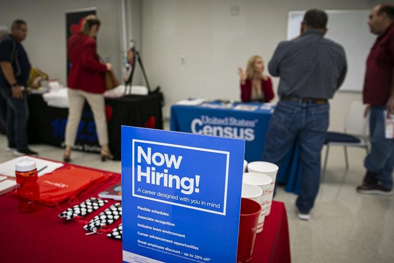 A job fair for Hispanic professionals in Miami, Florida. The US jobless rate could surge above 8 per cent in the next three months, according to Bloomberg News calculations. PHOTO: BLOOMBERG