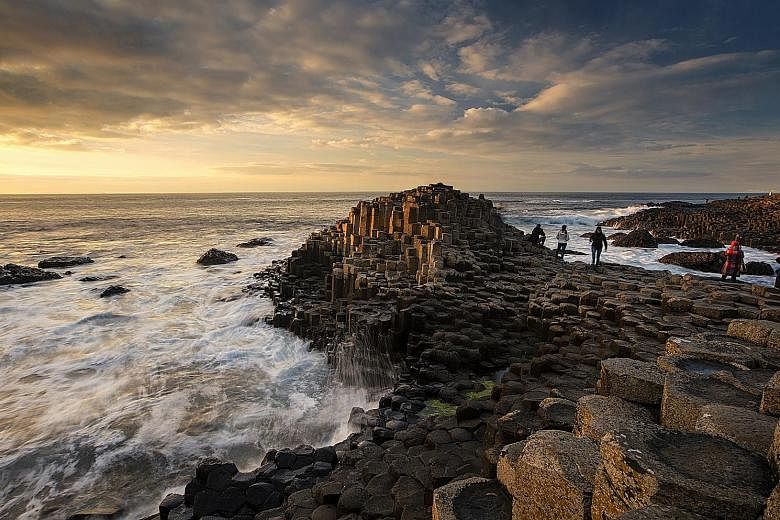 Giant’s Causeway in Northern Ireland has a stark beauty, compounded by rock basalt columns rising out of the water’s edge. Formed from volcanic eruptions millions of years ago, they look out of this world. 