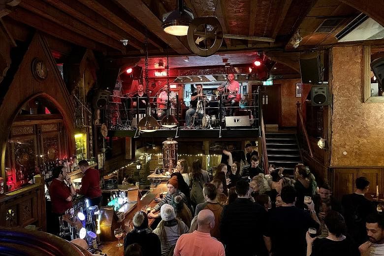 Enjoy music at The Quays Bar and Restaurant in Galway (above) and take a swig of whiskey at the Temple Bar in Dublin. 