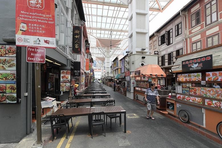 The scene in Smith Street yesterday. The Chinatown Business Association has organised events to encourage locals to visit the heritage site. ST PHOTO: ALPHONSUS CHERN