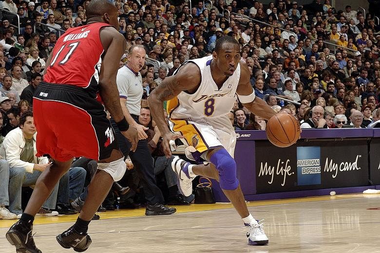 Kobe Bryant of the Los Angeles Lakers battling his way to an 81-point performance against the Toronto Raptors on Jan 22, 2006. The Lakers won 122-104 and Bryant's stunning display was behind only Wilt Chamberlain's 100-point performance. Just over 14