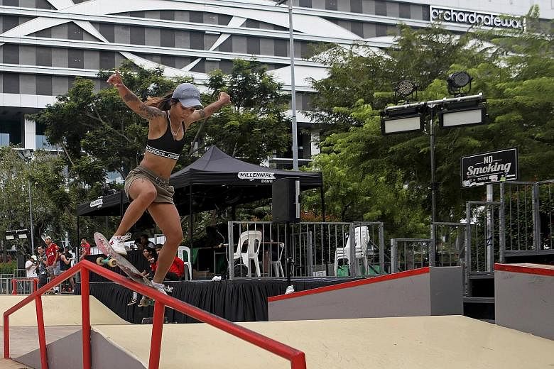 Thailand's Orapan Tongkong, 22, doing her tricks on Thursday at Somerset Skatepark, where the Asian Street Skateboarding Championship was supposed to be held. She is one of the foreign skaters affected by the cancellation of the event due to the coro