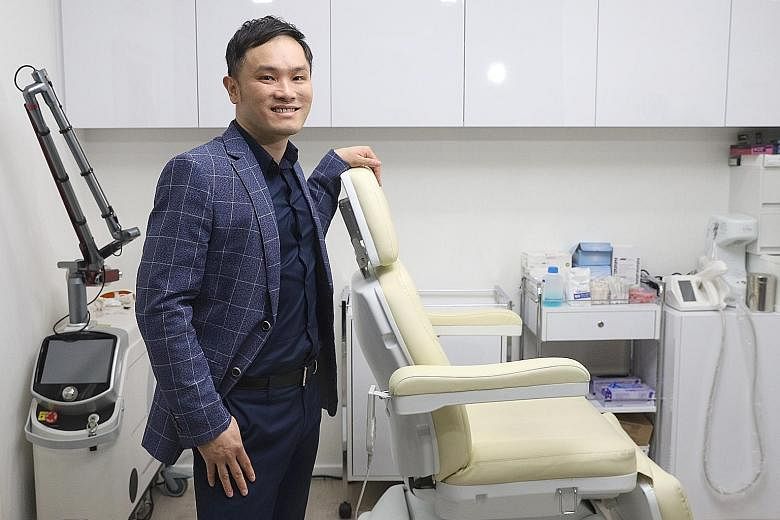 Aesthetic doctor Kelvin Chua at his Wheelock Place clinic. Dr Chua says it is important to be very familiar with the area one is investing in and not just take a financial adviser's word for it. And investment is "about being responsible financially 