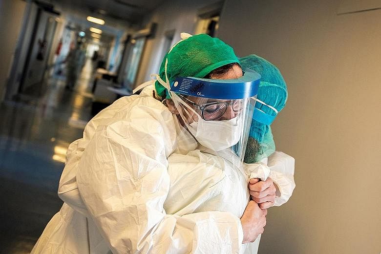 An emergency contingent of Cuban doctors and nurses arriving at the Malpensa airport in Milan, within the Lombardy region, on Sunday to help Italy in its long battle against the coronavirus pandemic. At Palazzo Marino in Milan, the headquarters of th