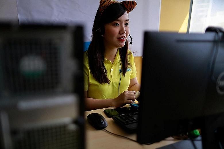 Filipino tutor Raven Kate De Leon teaching an online class as the coronavirus pandemic keeps students in China out of school and disrupts other aspects of life. PHOTO: REUTERS