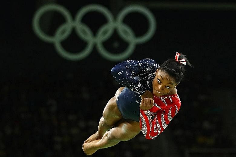 Clockwise, from left: Revered for their successes, footballer Johan Cruyff, gymnast Simone Biles and boxer Muhammad Ali were also so skilful that they created moves that were named after them. PHOTOS: ST FILE, REUTERS, EPA-EFE